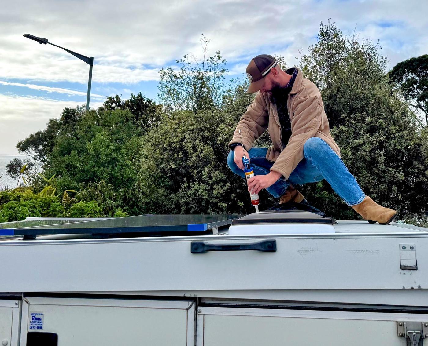 Rhys from Caravan and Trailer Handyman working on a caravan